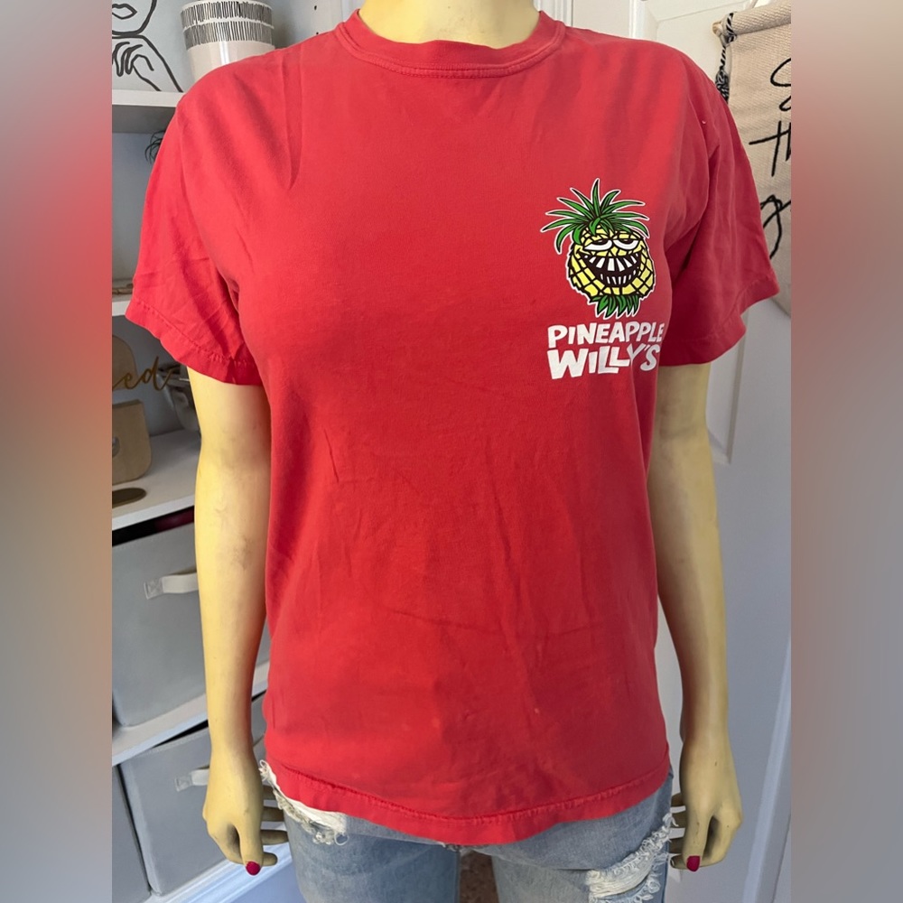 A bright dark pink Pineapple Willy’s t-shirt!